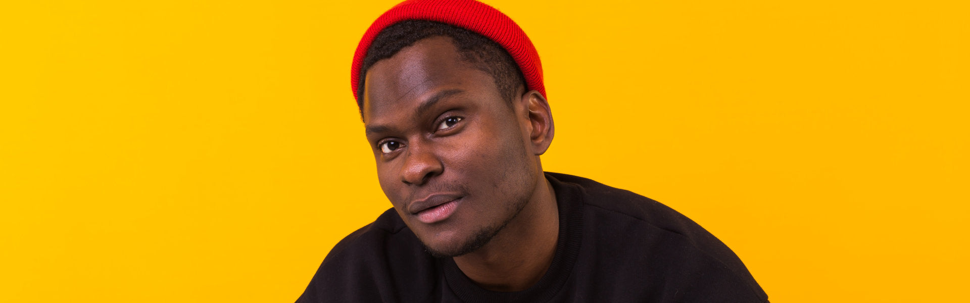 man wearing red bonnet
