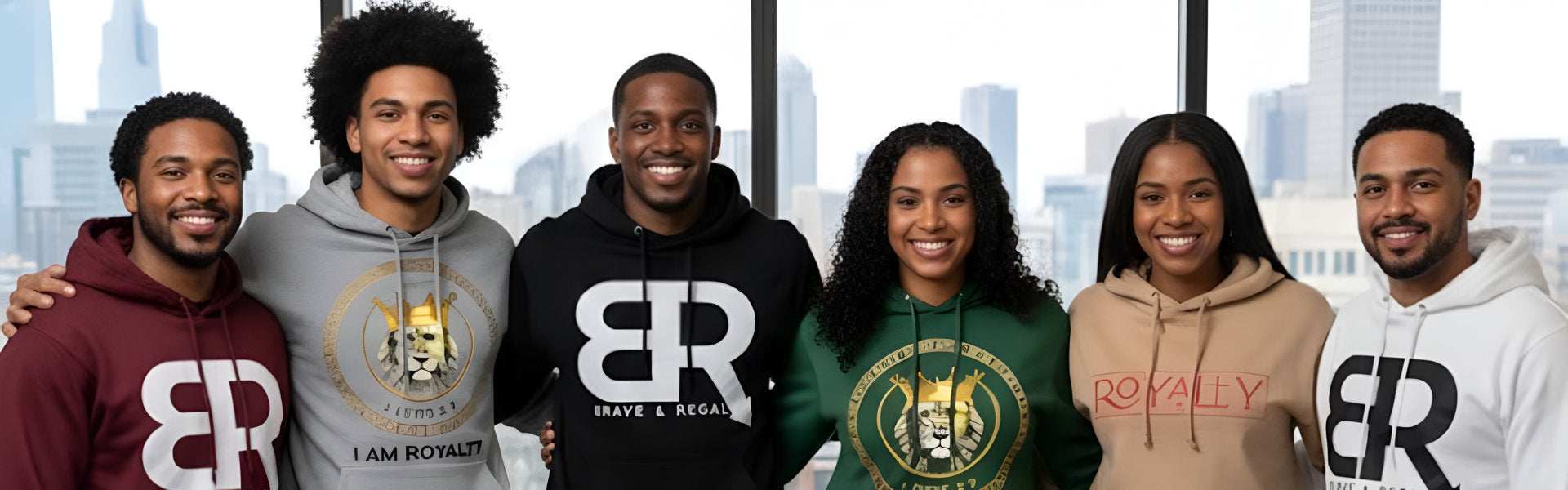 Six individuals wearing various Brave & Regal hoodies stand together in front of a cityscape window.